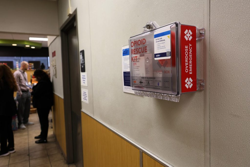 NaloxBox rescue kit nailed to the restroom wall of a Turkey Hill gas station